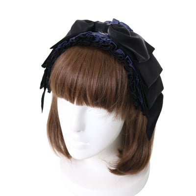 【Triple Fortune】コサージュと羽根飾りの付いた黒のシルクハット Triple Fortune】コサージュと羽根飾りの付いた黒のシルクハット