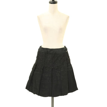 USED】ANARCHY レタリングプリントラップ風スカート | h.NAOTO